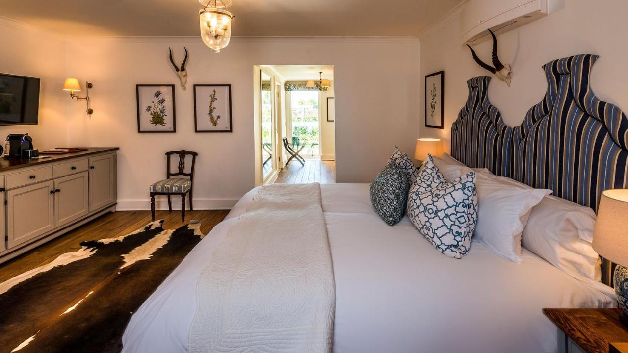 Drostdy Hotel Graaff-Reinet Exterior foto A bedroom at the Oyster Box