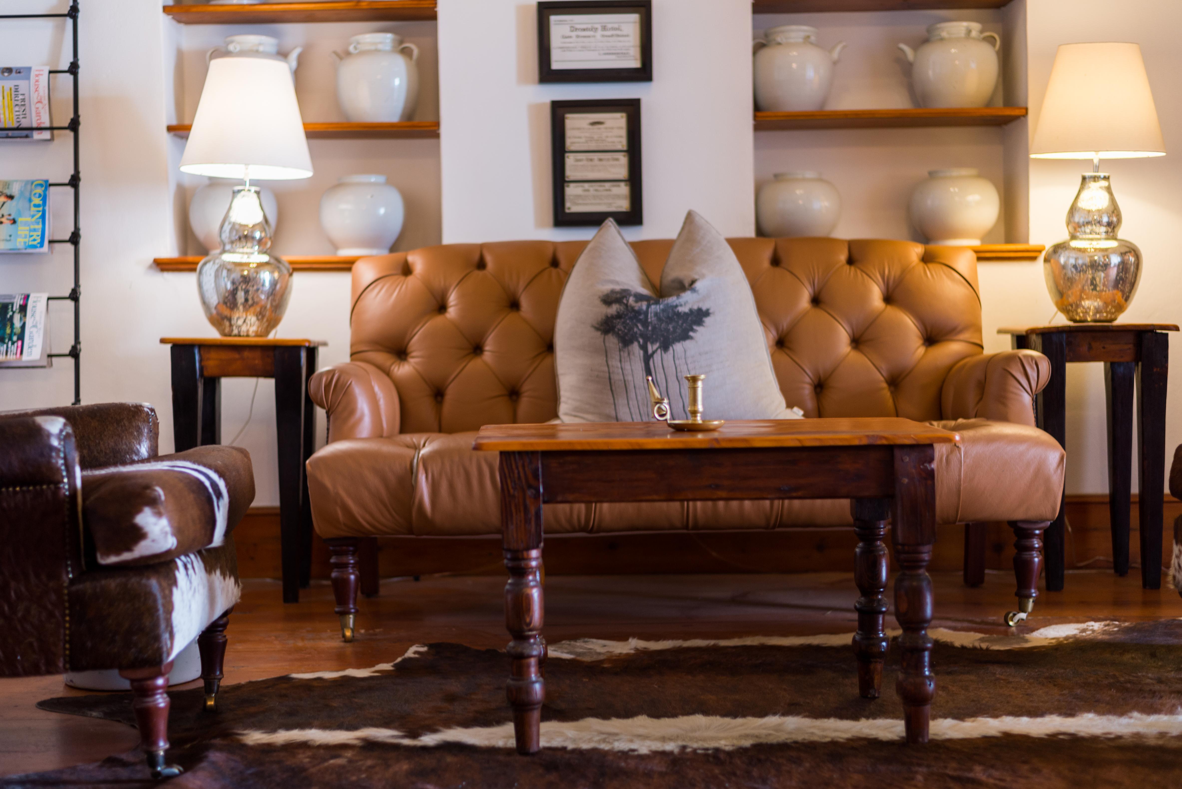 Drostdy Hotel Graaff-Reinet Exterior foto A leather sofa
