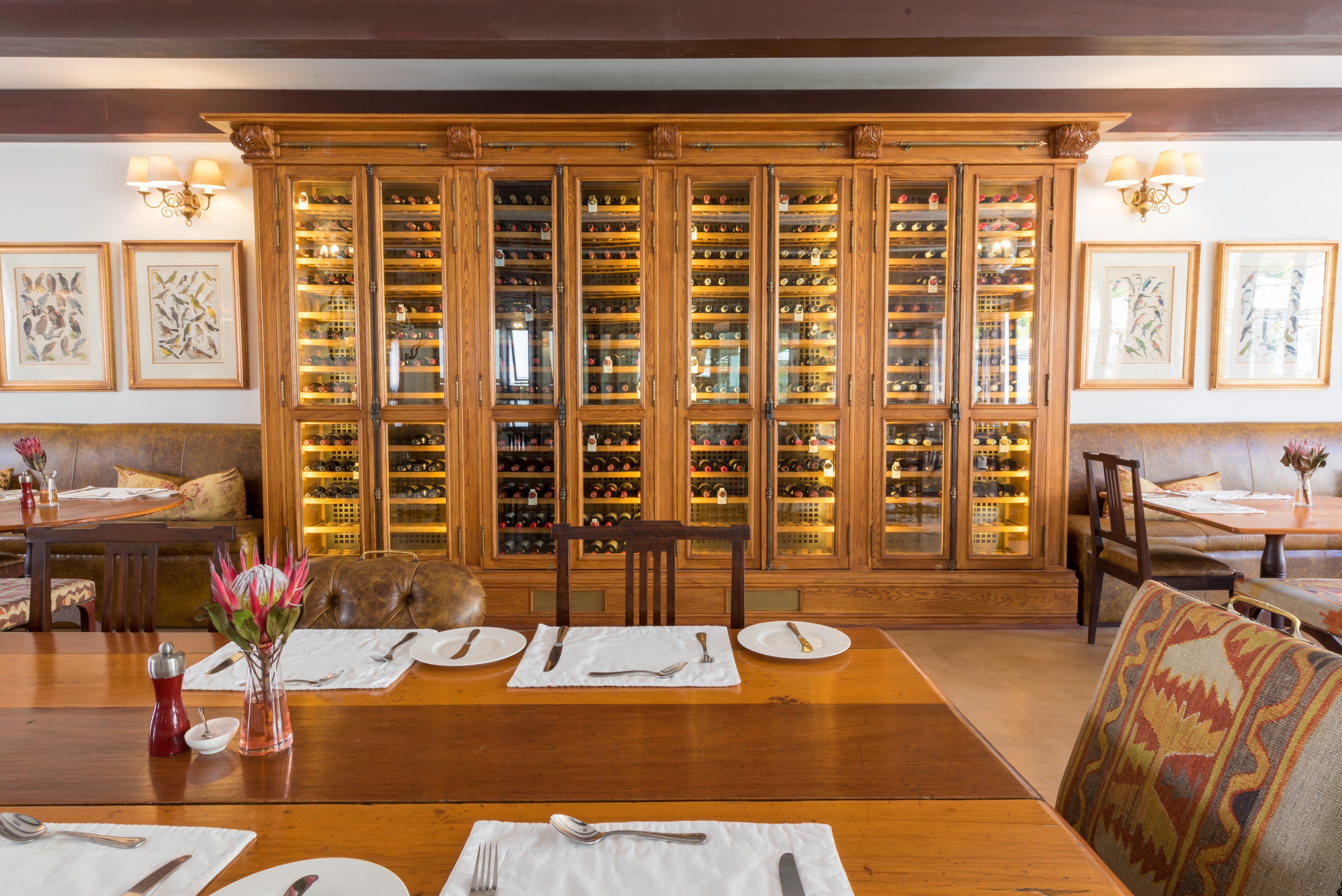 Drostdy Hotel Graaff-Reinet Exterior foto Wine rack at the restaurant